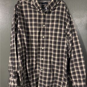 Tommy Hilfiger men’s button-down shirt featuring a classic gingham or plaid.